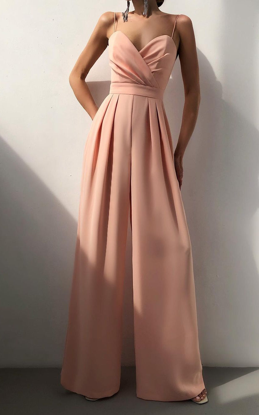 Blush pink strapless jumpsuit with pleated wide-leg pants, perfect for modern fashion ملابس