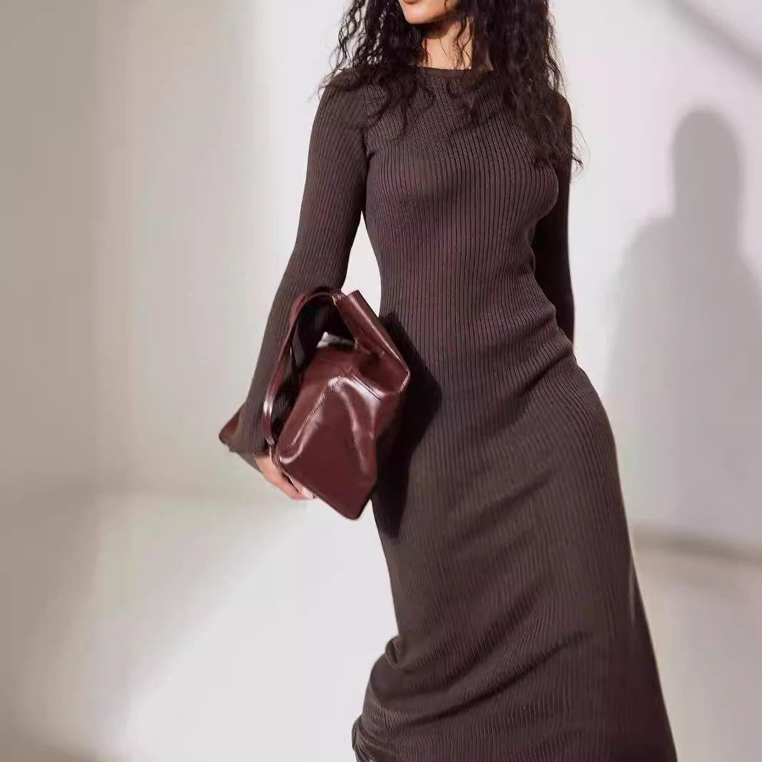 Elegant brown ribbed knit dress with matching handbag showcasing Slim Fit Woolen Knitted Dress for fashion enthusiasts