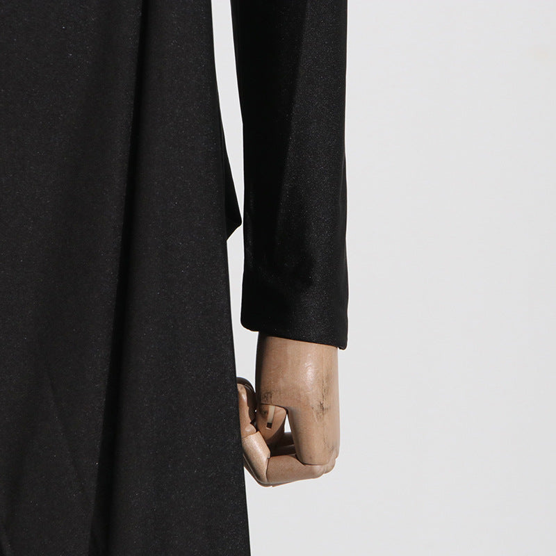 Wooden mannequin hand in black sleeve showcasing Elegant Socialite Dress fashion ملابس