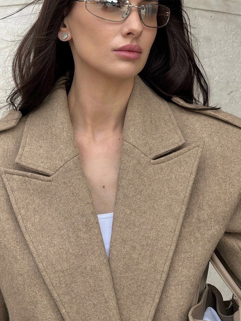 Elegant beige wool langry fashion coat with double-breasted notched lapels