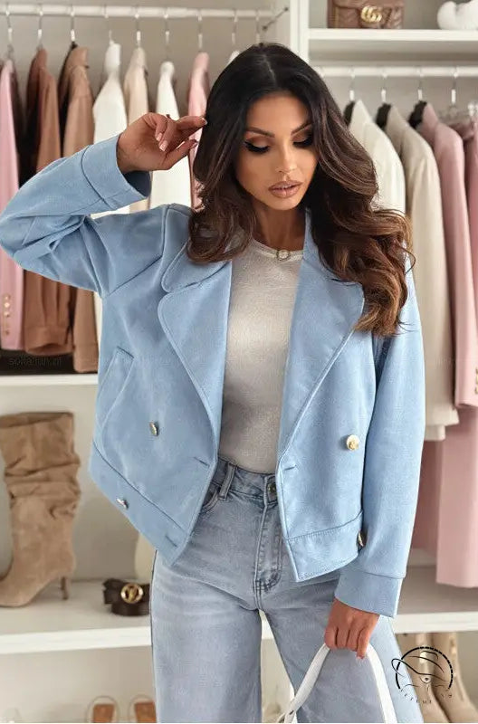 Langry slim collared suede short coat in light blue denim with gold buttons and pearl necklace fashion ملابس