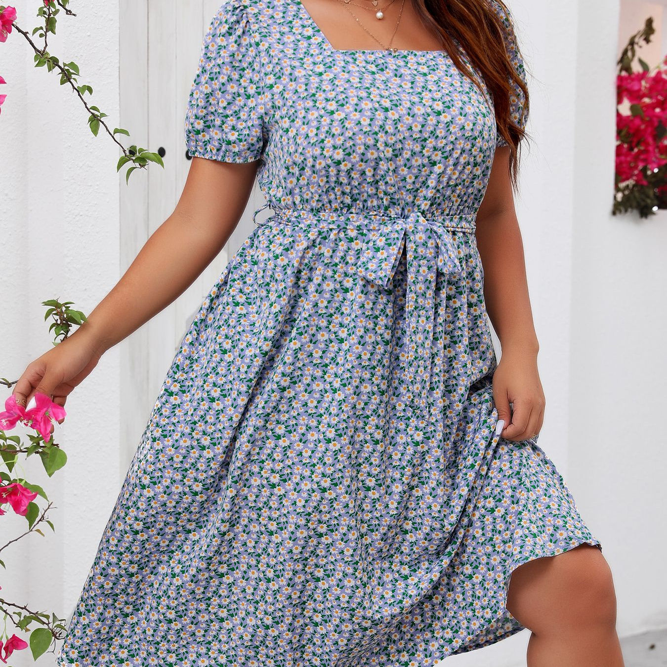 Plus-size floral summer dress with square neck puff sleeves and tie waist