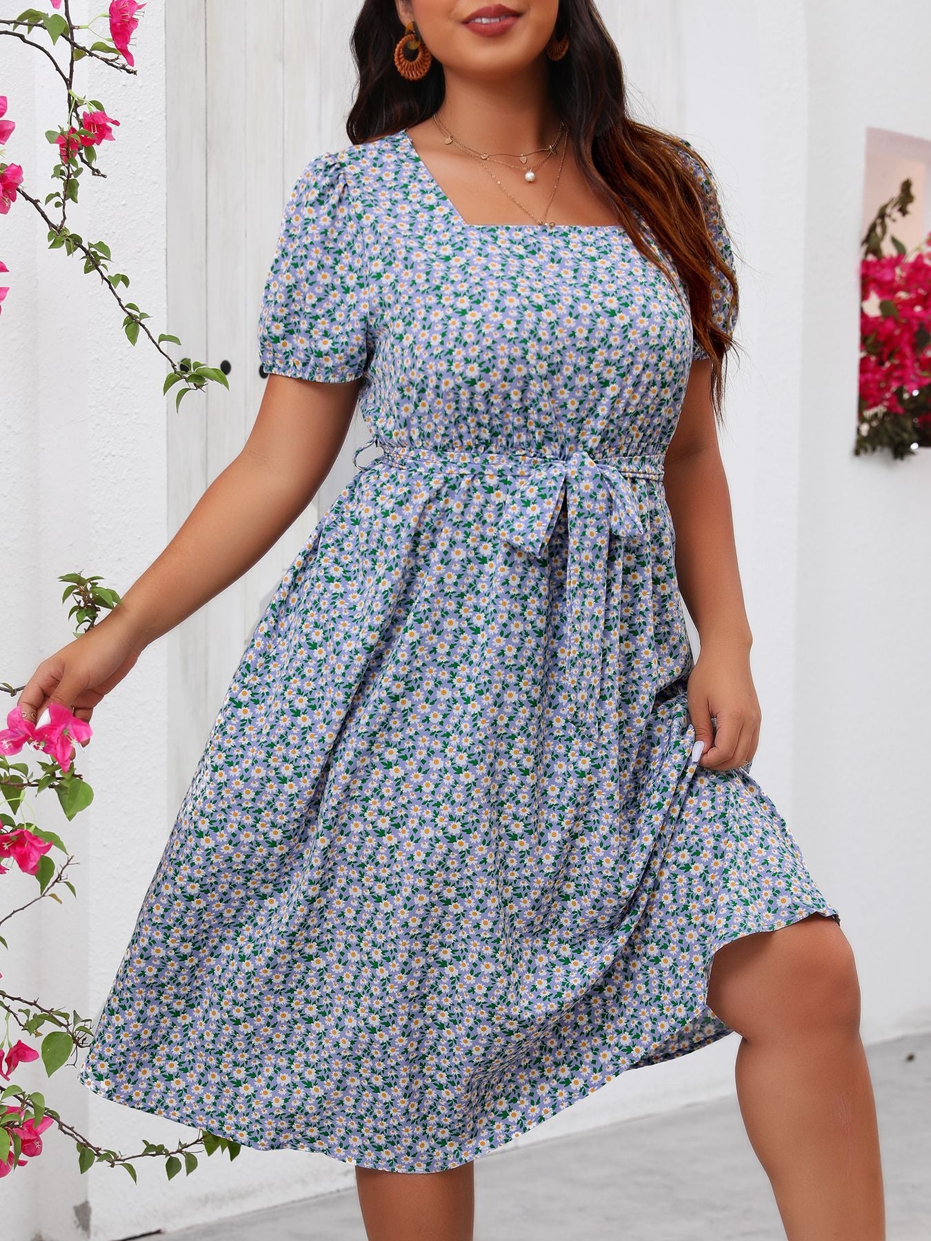 Plus-size floral summer dress with square neck puff sleeves and tie waist