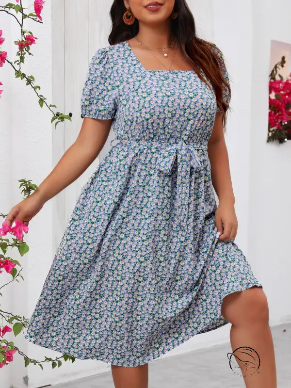 Plus-size floral summer dress with square neck, puff sleeves, tie waist