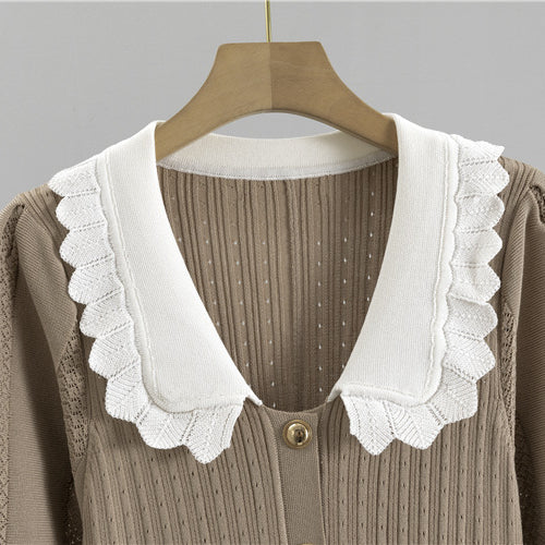 Beige knit cardigan with white scalloped collar, perfect for winter fashion ملابس