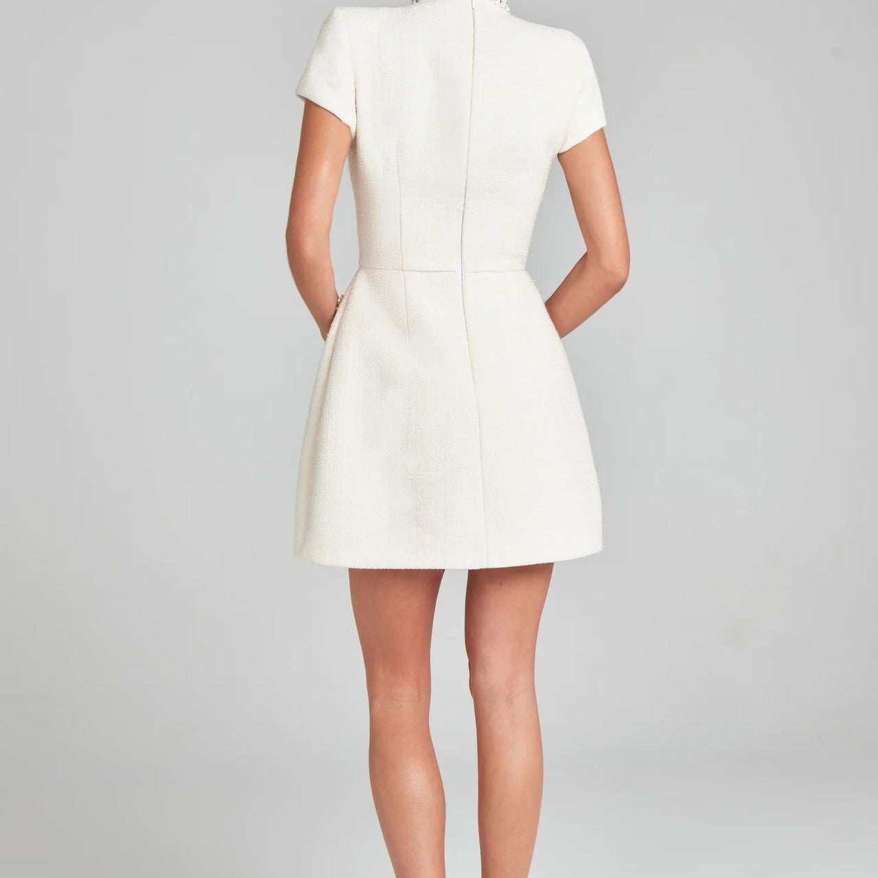 Elegant Slim Classic Dress: Short white dress with cap sleeves, showcasing modern fashion design