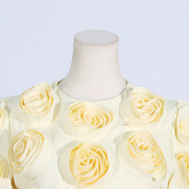 Cream-colored puff sleeve dress with fabric roses in a floral pattern for summer fashion