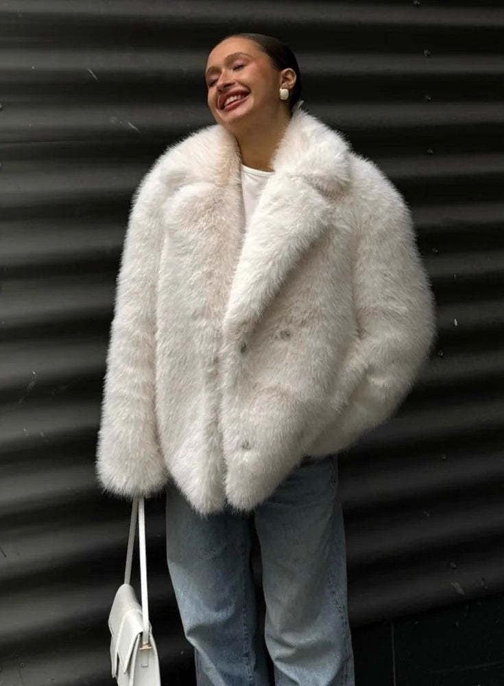 White fluffy faux fur jacket with silver embellishments in Langry fashion