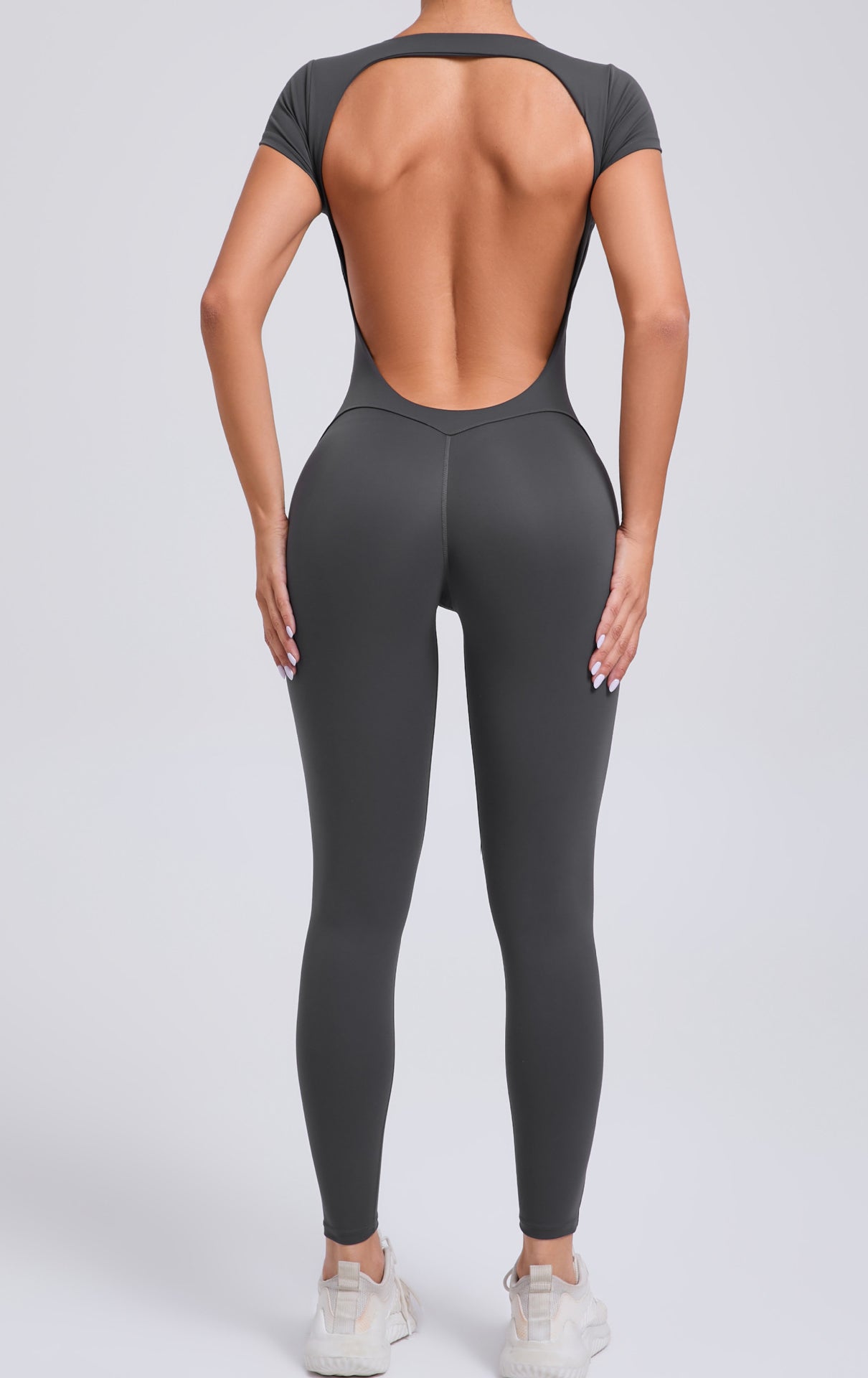 Sleek dark gray langry fashion yoga bodysuit with cutout back