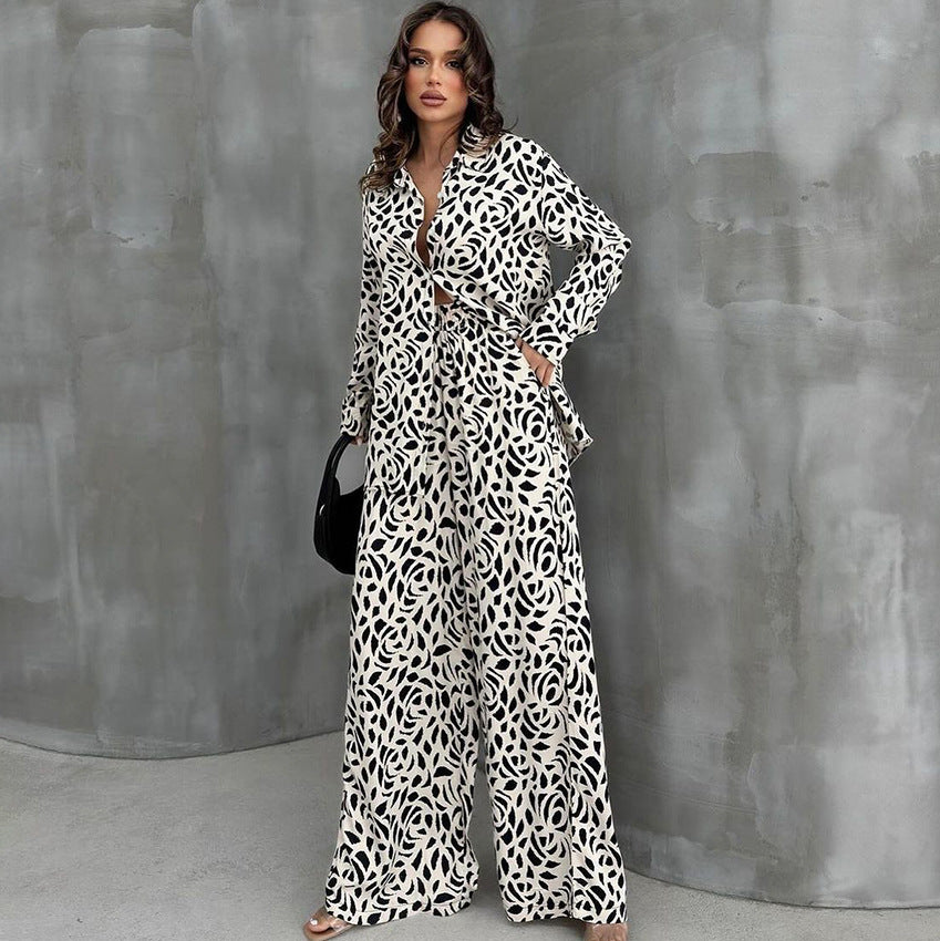 Black and white loose leopard print pajamas set with wide-leg pants and collared top