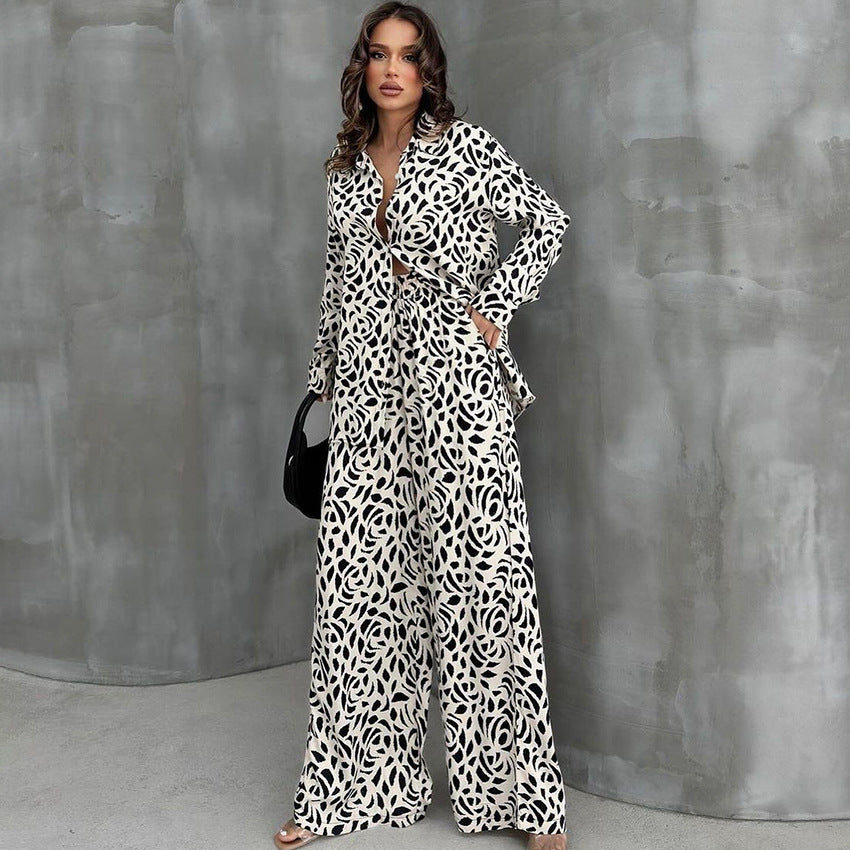 Black and white loose leopard print pajamas set with wide-leg pants and collared top