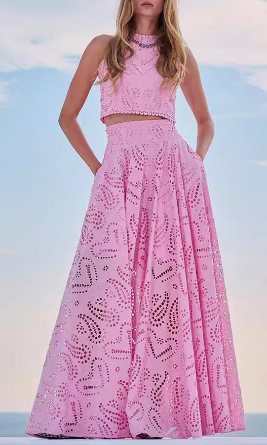 Pink eyelet crop top and maxi skirt set from Langry, perfect for casual vacation fashion ملابس
