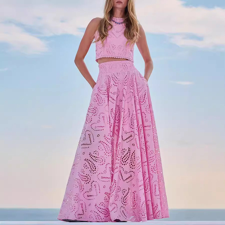 Pink eyelet crop top and maxi skirt set from Langry, perfect for casual vacation fashion ملابس