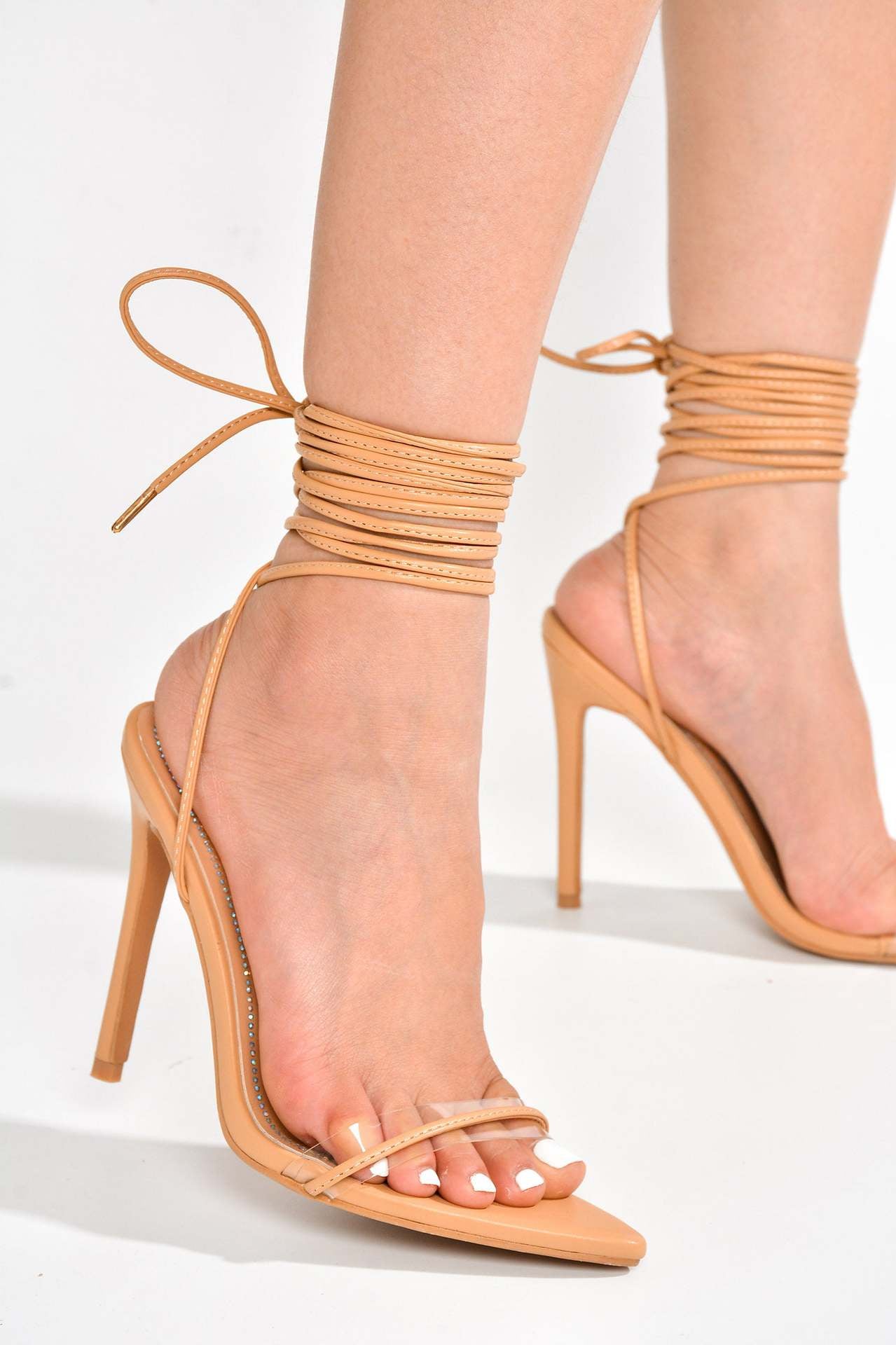 Nude strappy stiletto heels for fashion and ملابس, perfect for elegant style