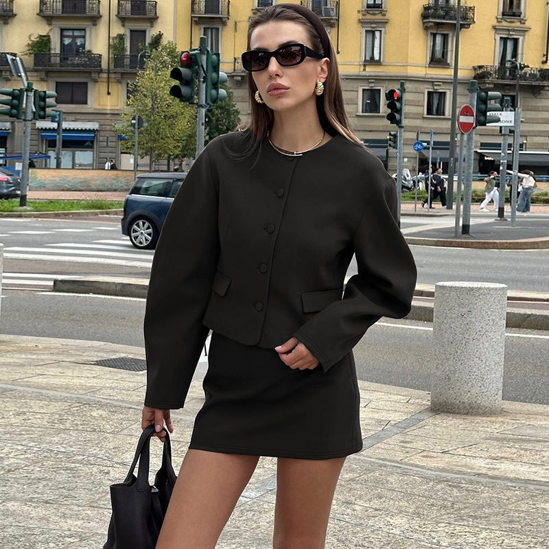 Woman in dark green skirt suit from Modern Cardigan Top Slim Fit Skirt Set fashion ملابس