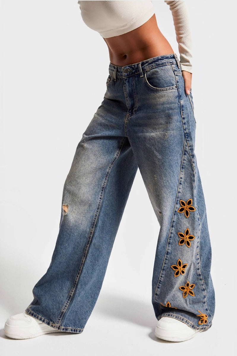 Fashionable high waist langry wide-leg denim trousers with floral embroidery, blue wash