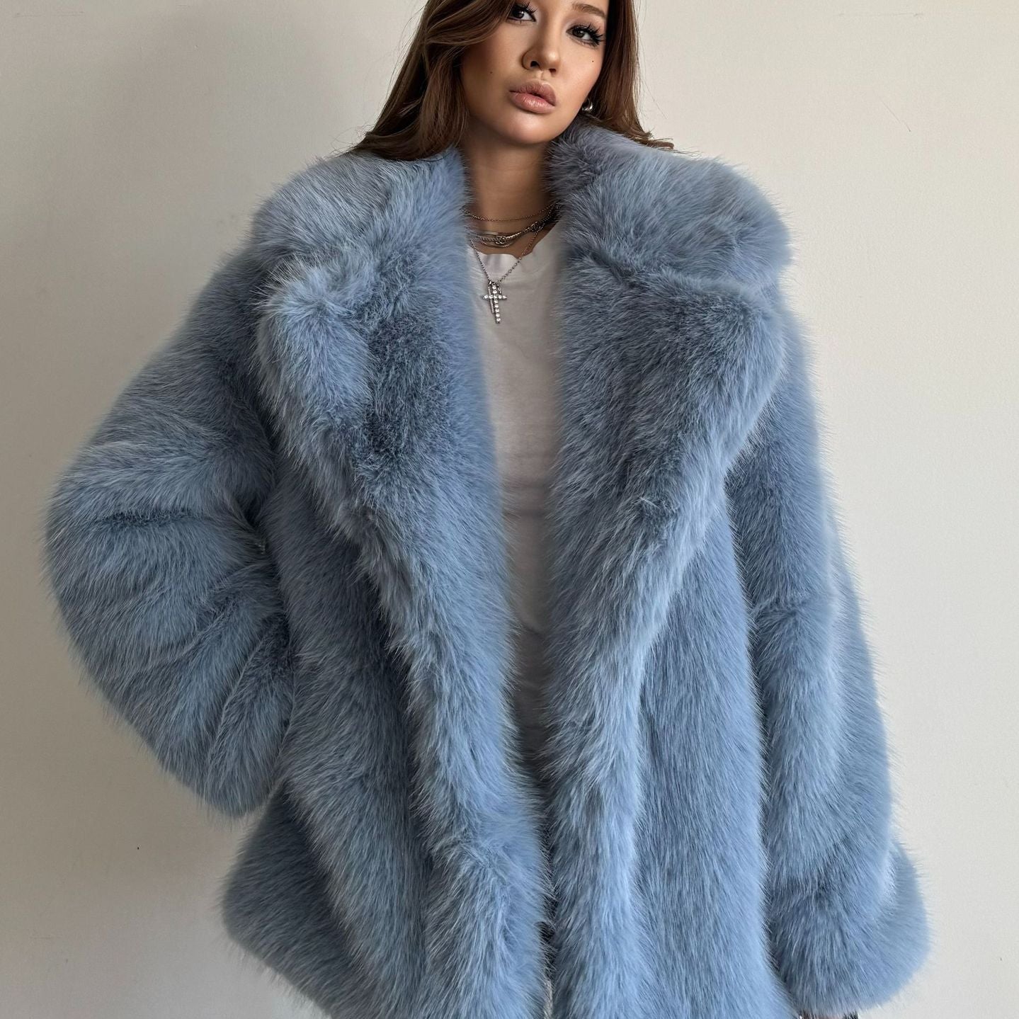 Light blue faux fur coat with fox collar and long sleeves
