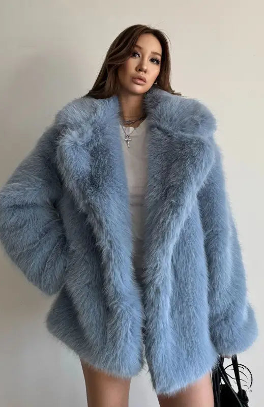 Light blue faux fur coat with fox collar and long sleeves