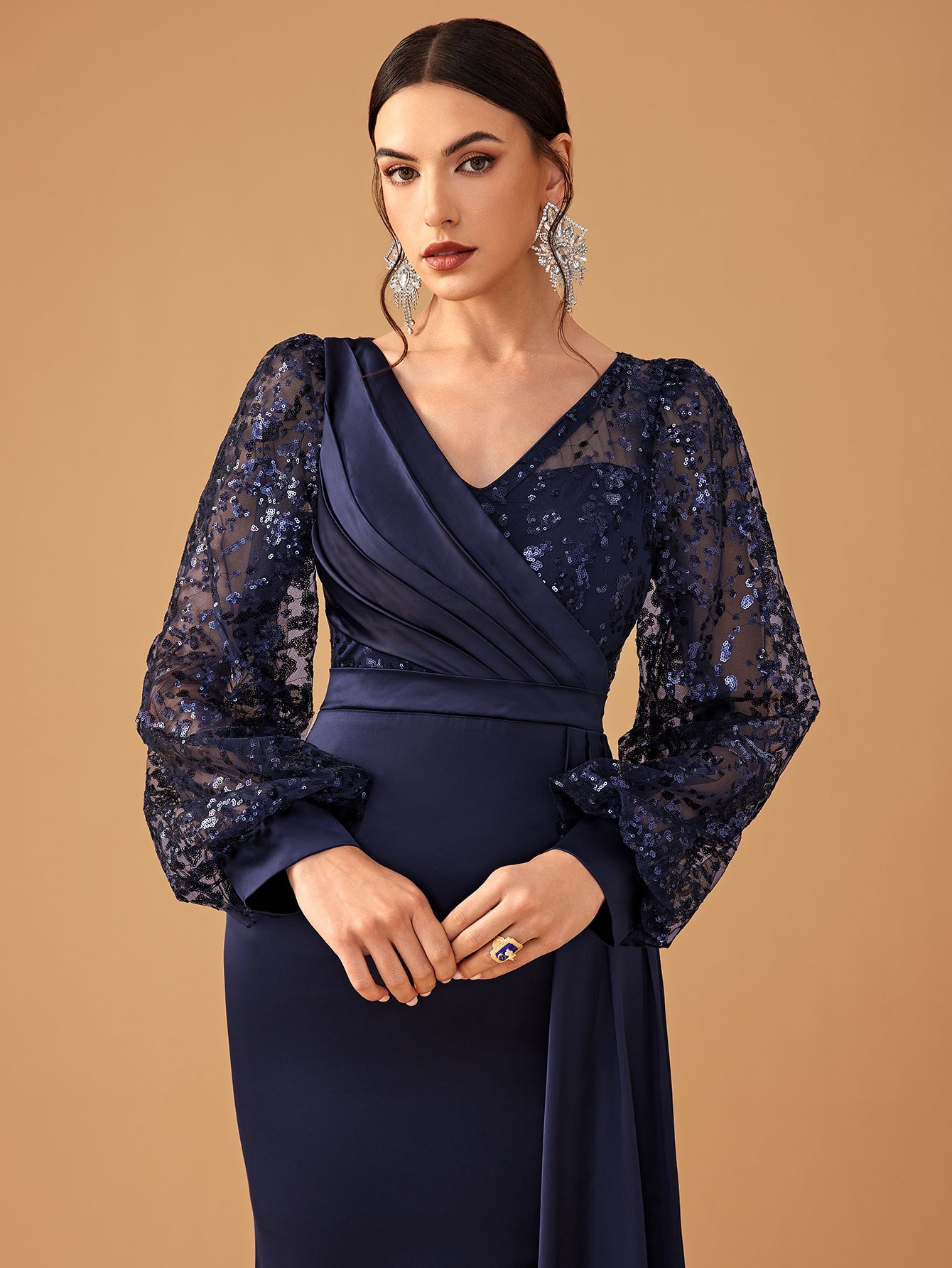 Elegant navy blue evening gown showcasing sophisticated fashion and luxurious style