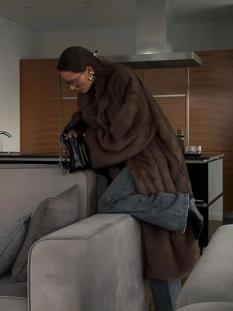 Brown Vintage Langry Faux Fur Jacket with Blue Jeans and Black Boots