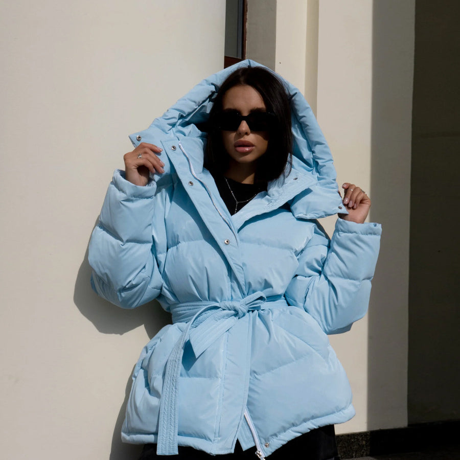 Light blue hooded thermal puffer jacket with tie belt for fashion and ملابس style