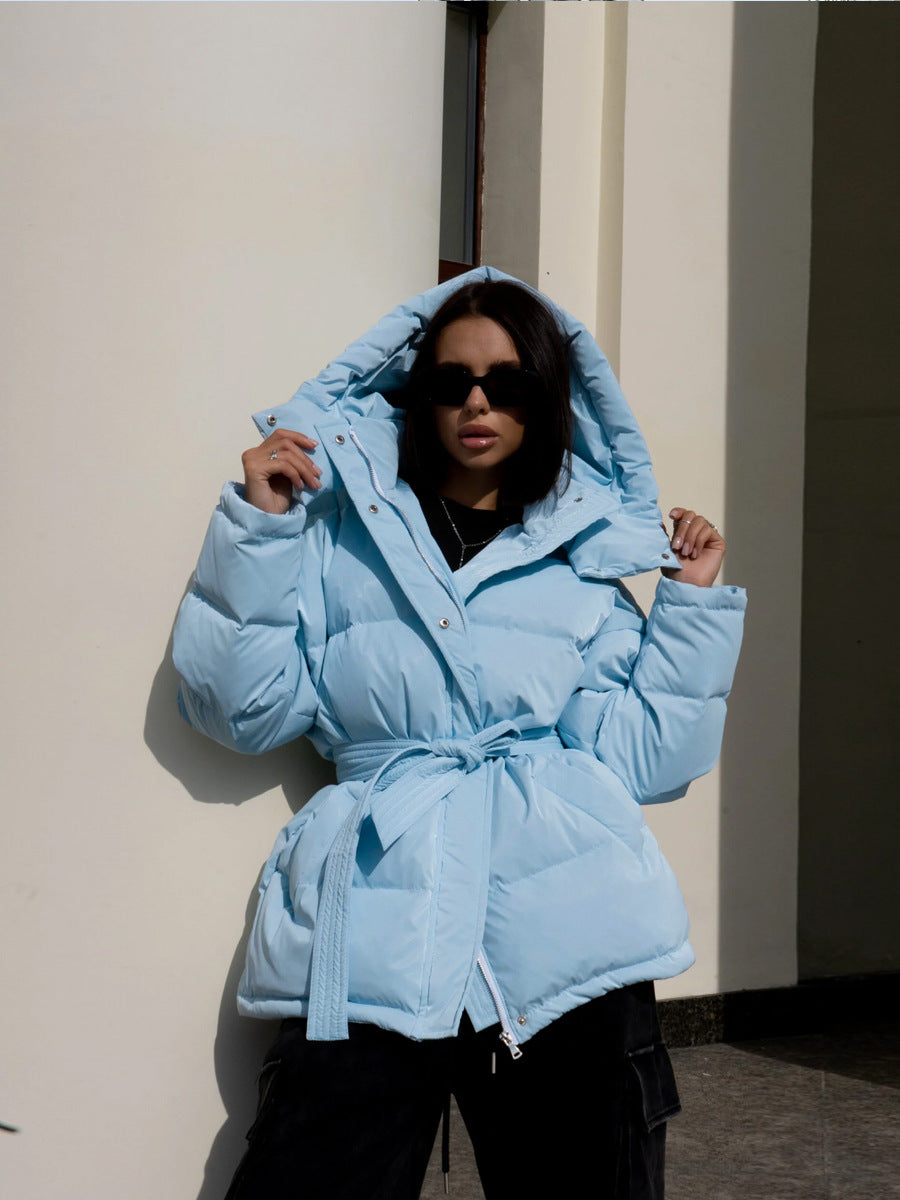 Light blue hooded thermal puffer jacket with tie belt for fashion and ملابس style