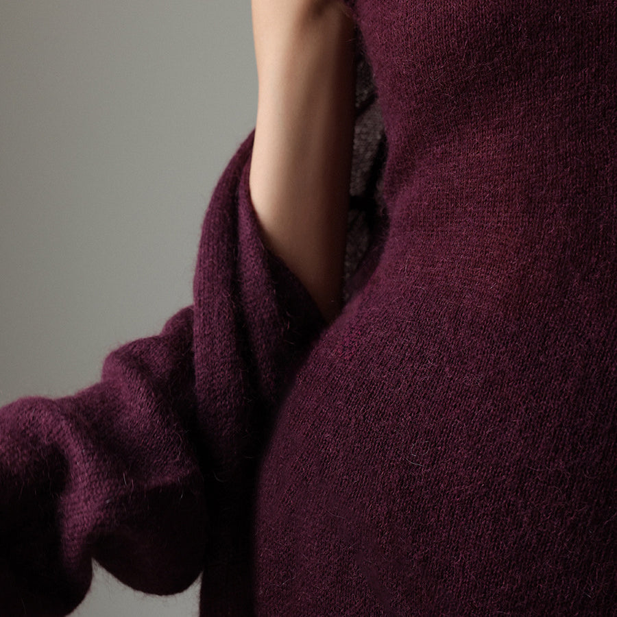 Maroon textured knitted cardigan with rolled sleeves and pocket detail