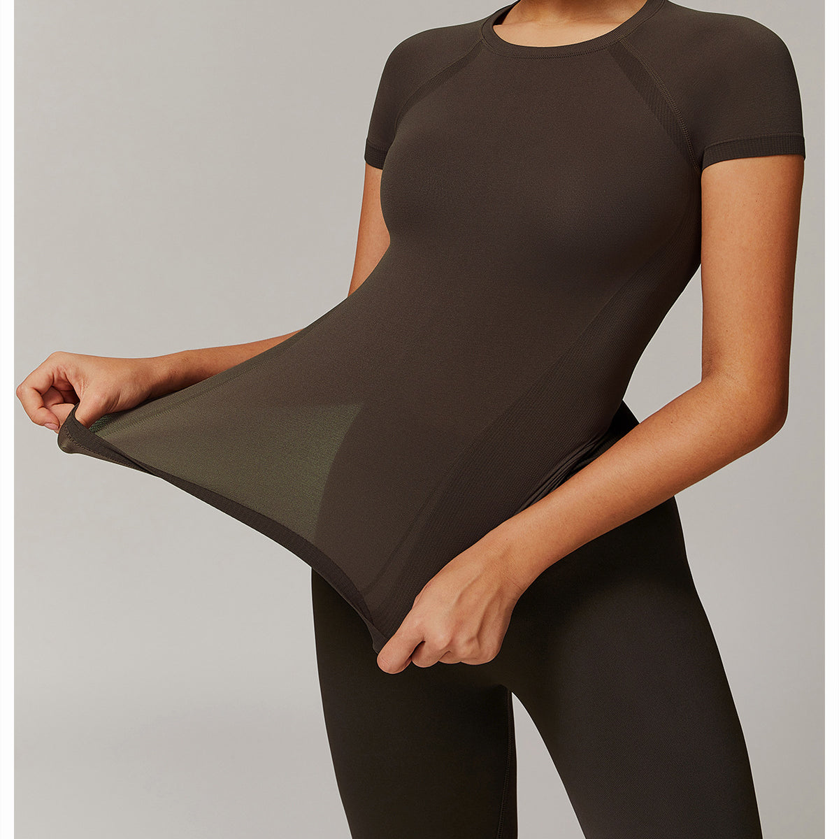 Stretchy dark brown athletic top and leggings from Thread Seamless for yoga fashion ملابس