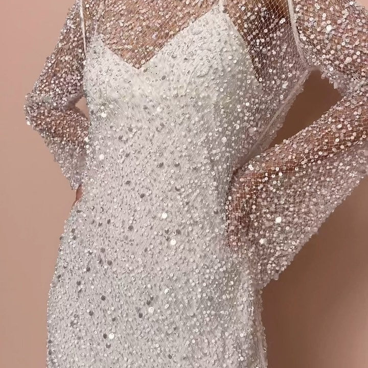 Sparkly white mini dress with long sleeves featuring trendy fashion style for elegant ملابس