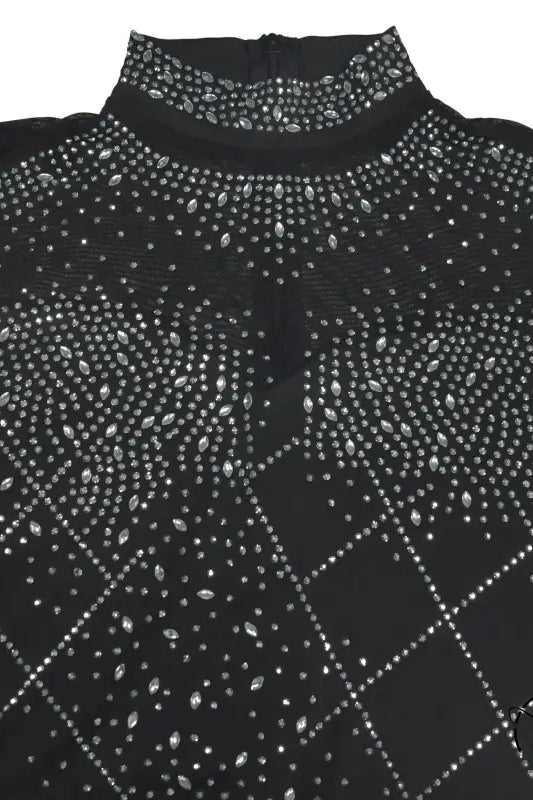 Black rhinestone-studded turtleneck in amazing split maxi dress