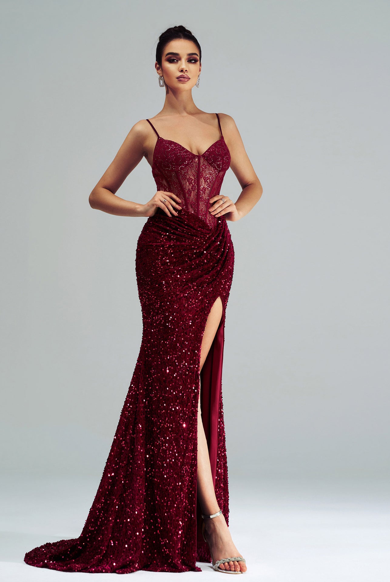 Burgundy sequined mermaid gown with thigh-high slit for elegant evening fashion ملابس
