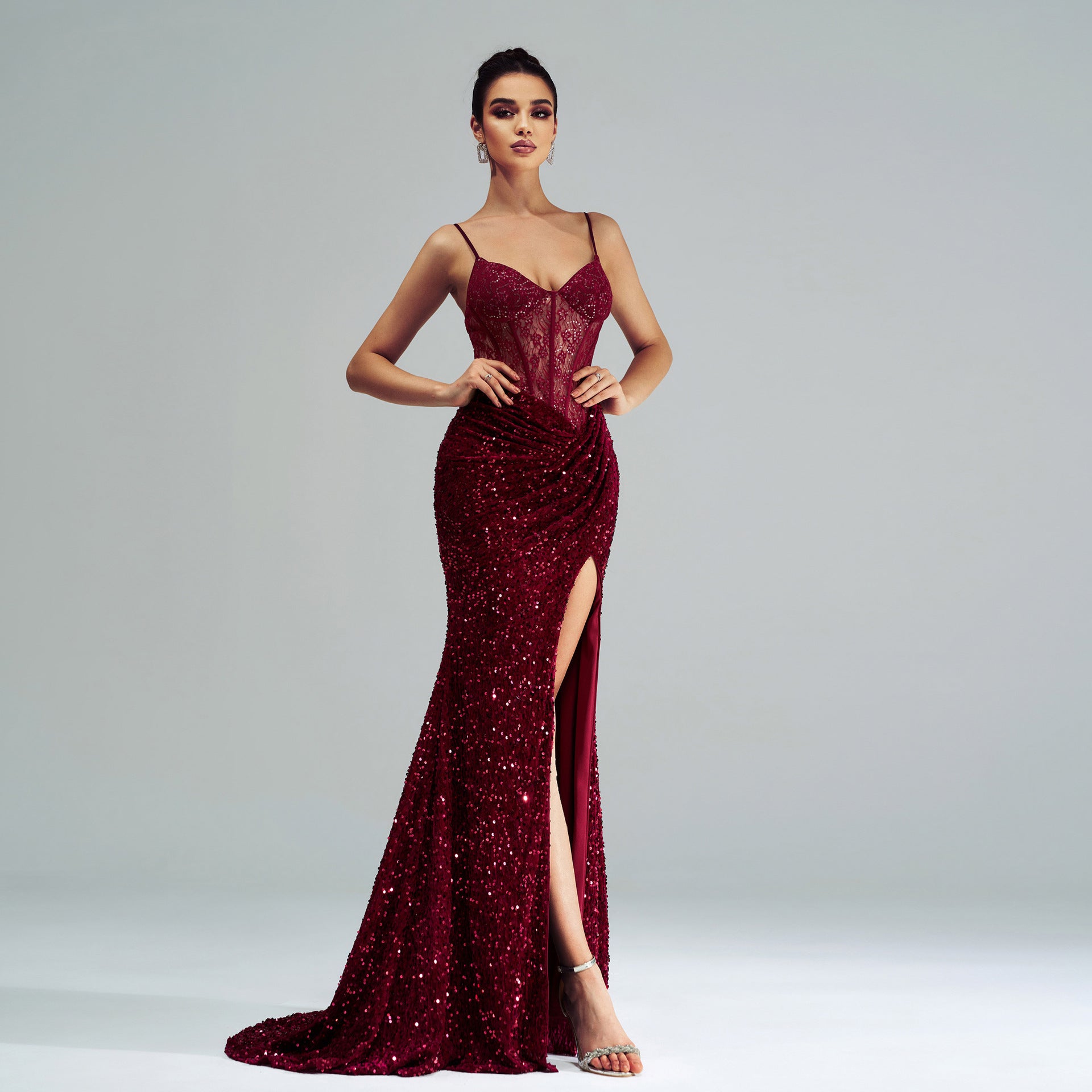 Burgundy sequined mermaid gown with thigh-high slit for elegant evening fashion ملابس