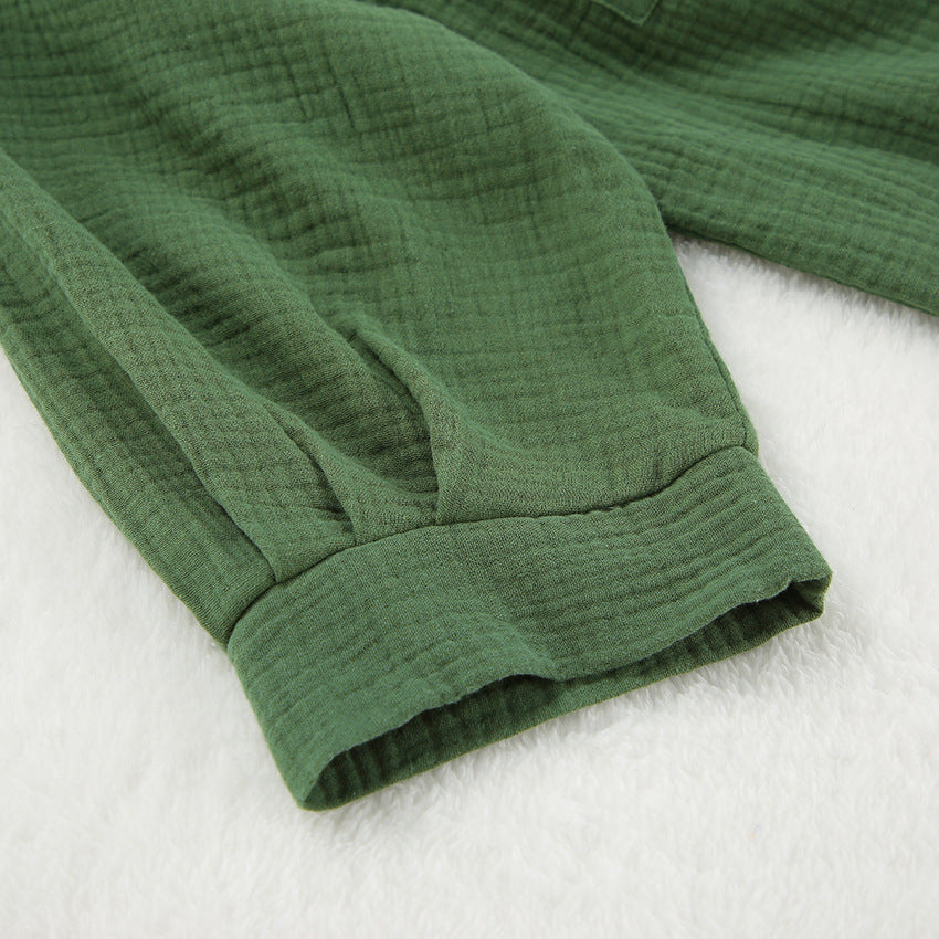 Green textured fabric sleeve from Comfortable Skin Friendly Winter Pajamas showcasing fashionable ملابس for warmth