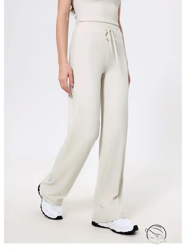 Langry cream knit sweatpants with drawstring, black white sneakers