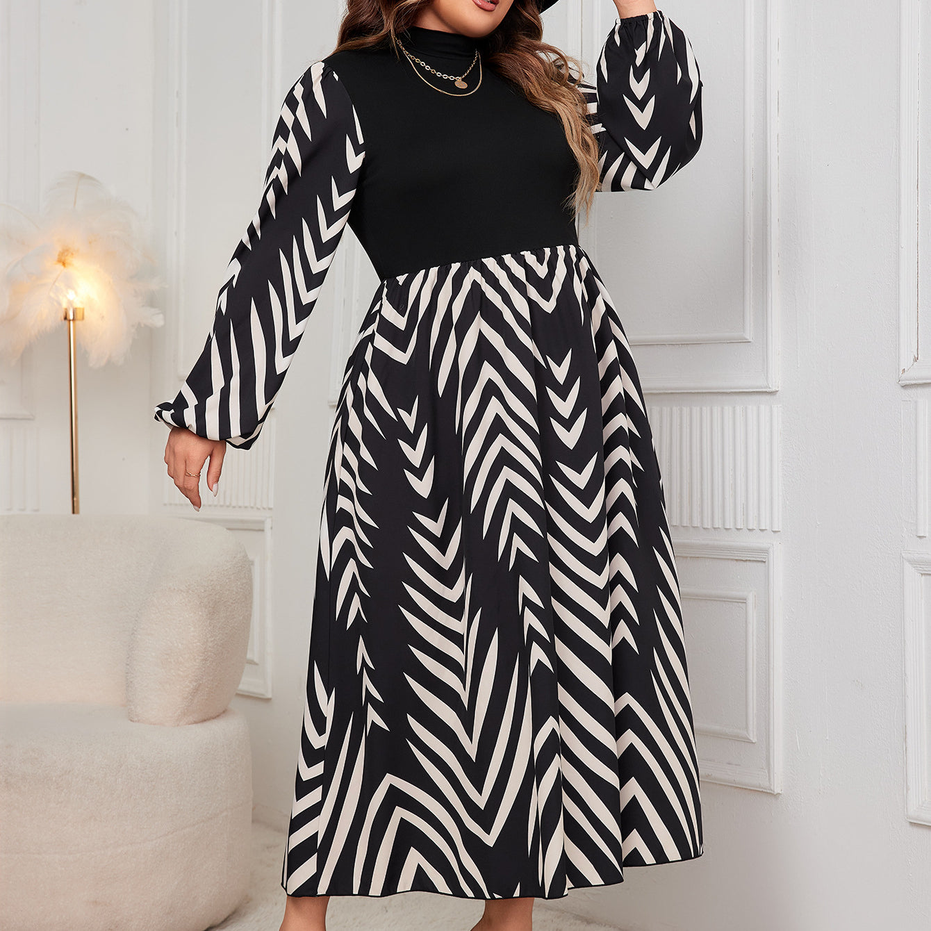 Elegant Puff Sleeve High Waist Dress features a stylish black and white patterned design