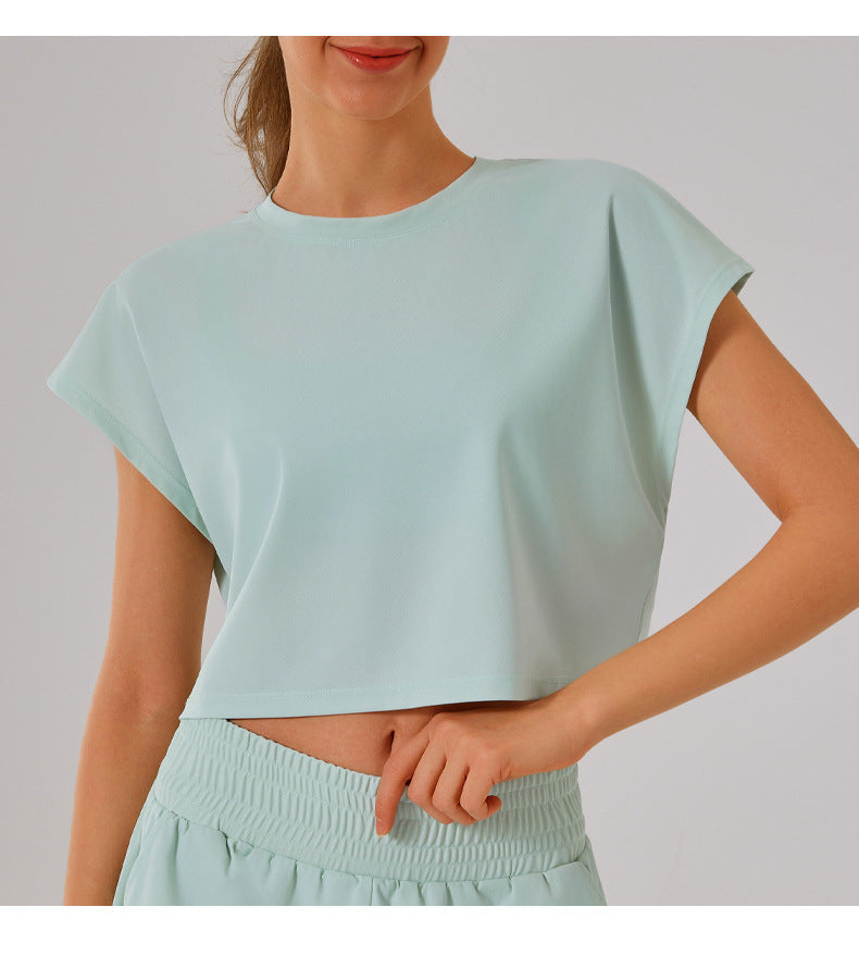 Mint green cropped t-shirt with cap sleeves from the Loose Sports Yoga Fitness Set in fashion ملابس