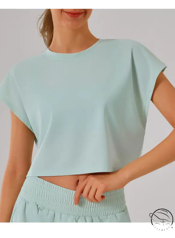 Mint green cropped t-shirt with cap sleeves in loose sports yoga fitness set