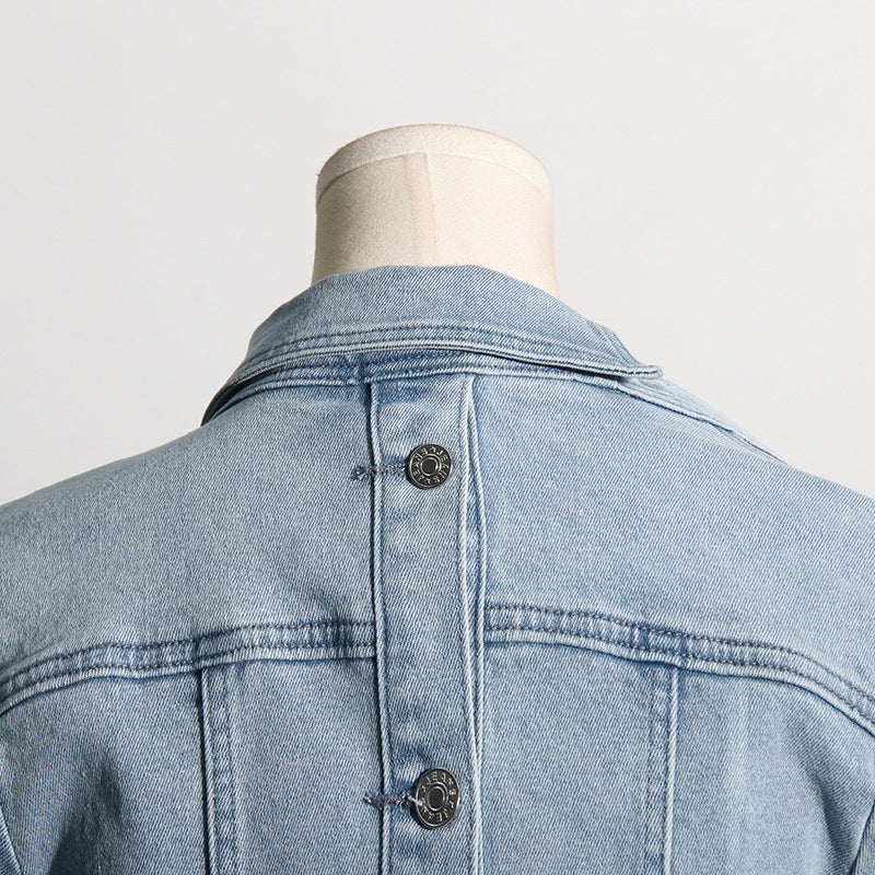 Light blue denim jacket back showcasing Off the Shoulder Design, perfect for lazy fashion days