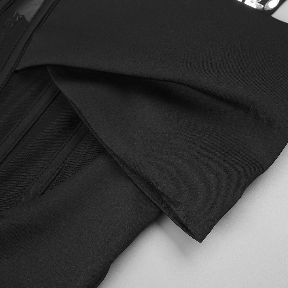 Black dress pants with a folded hem styled with an Attractive Black Rhinestone Maxi Dress