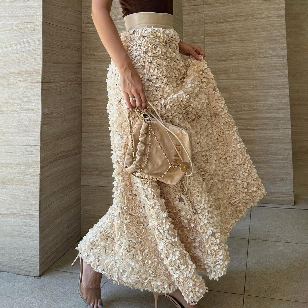 Textured cream-colored maxi skirt from Winter Petal Design, ideal for stylish fashion choices
