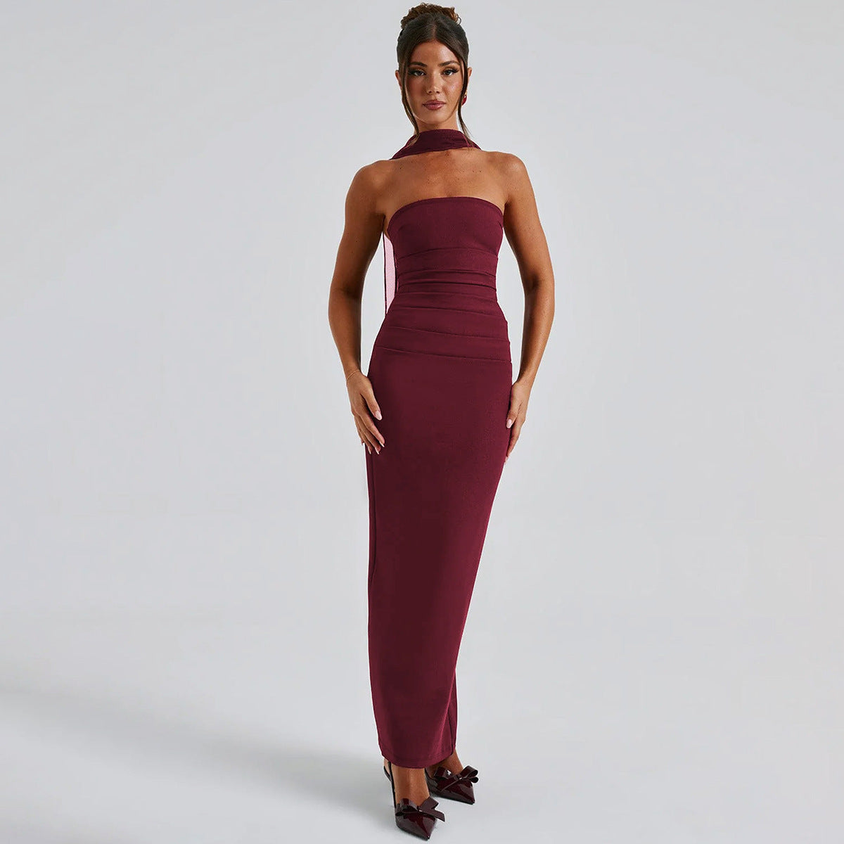Elegant Burgundy halter-neck maxi dress showcasing stylish fashion and luxury ملابس