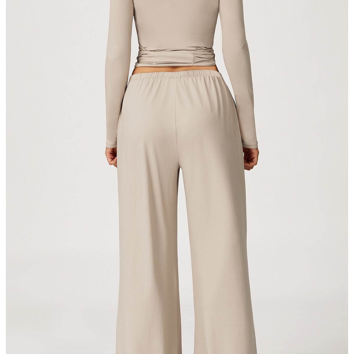Langry beige wide-leg yoga jumpsuit with belt detail, fashion ملابس