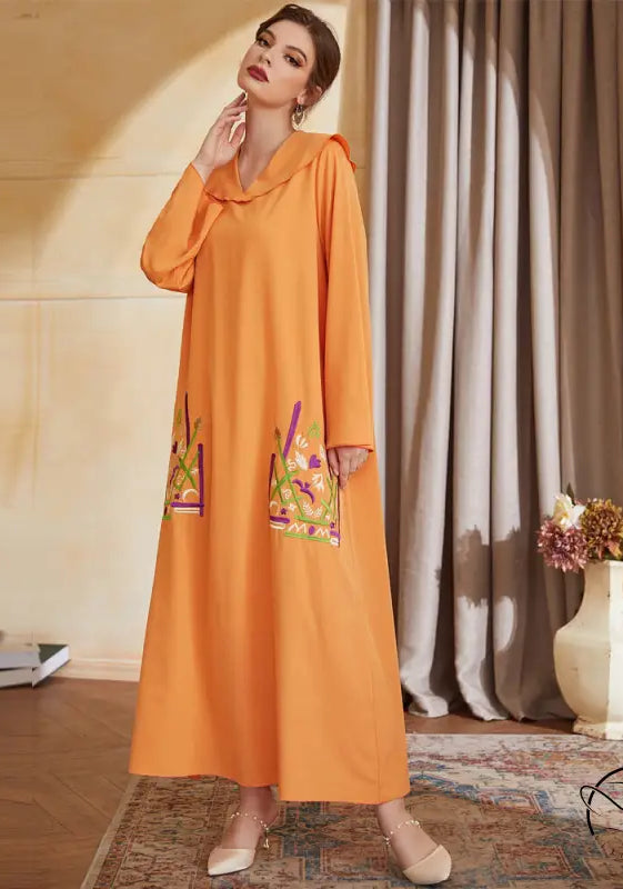 Orange floral embroidered abaya in langry fashion, hooded neckline and pockets