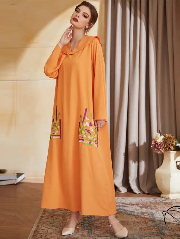 Orange floral embroidered abaya in langry fashion, hooded neckline and pockets
