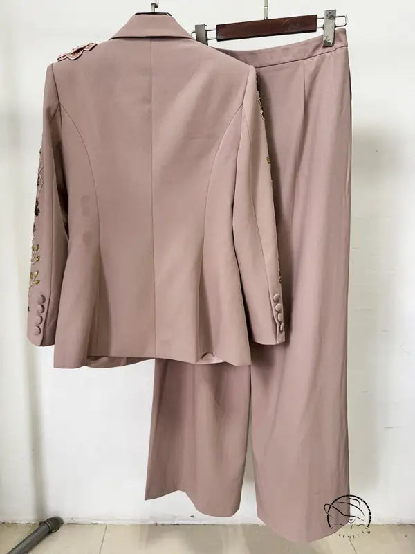 Elegant floral jacket in dusty rose with embellished sleeves