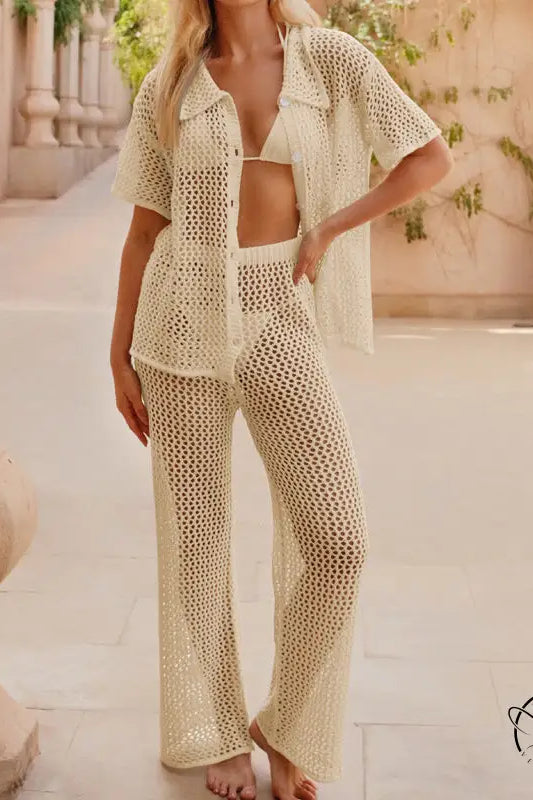 Cream-colored crochet beach loose shirt and casual trousers set