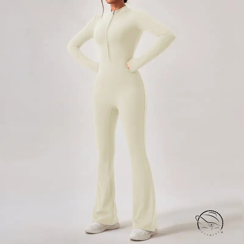 Cream-colored zip-front Comfy One Piece Sportswear jumpsuit with flared legs and long sleeves