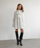Elegant Thick Matte Satin Dress featuring a flowy mini design with ruffled collar and boots
