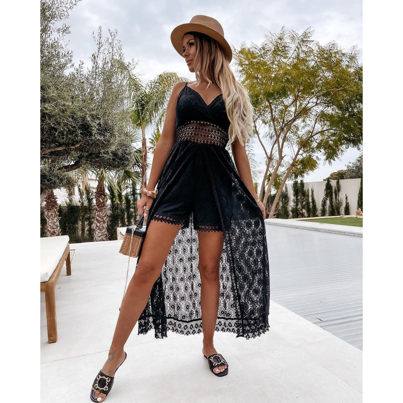 Black lace maxi dress with crochet waist detail, featuring stylish underlayer in fashion ملابس