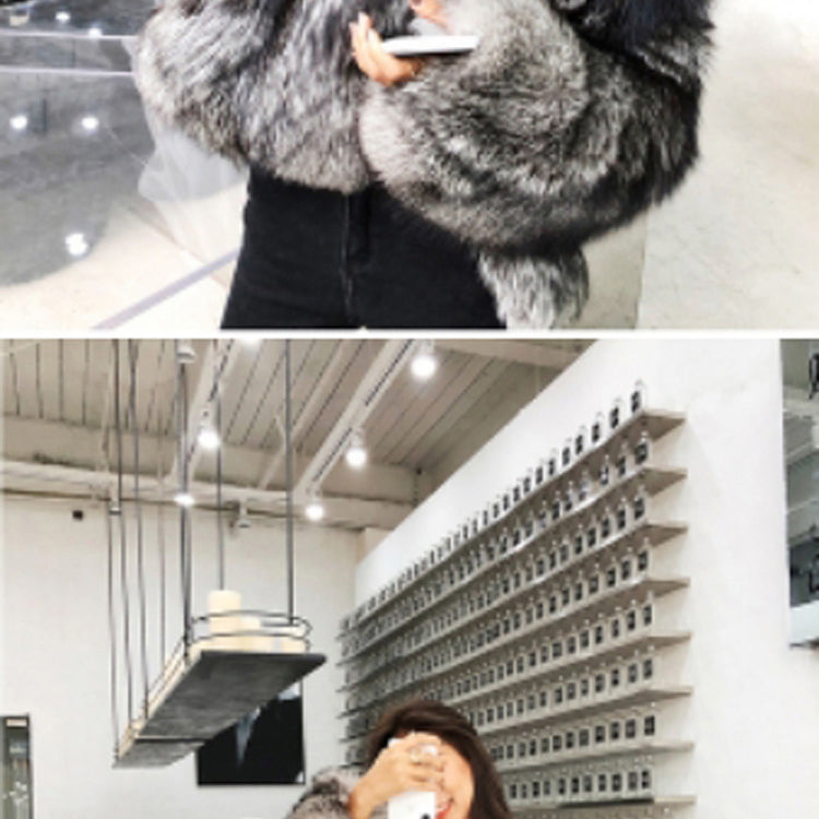 Luxurious grey and black faux fur coat with a plush texture for stylish winter fashion